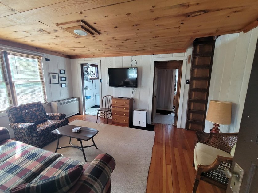 Enjoy stunning water views from this 2-bedroom, 1-bathroom cabin - photo 6