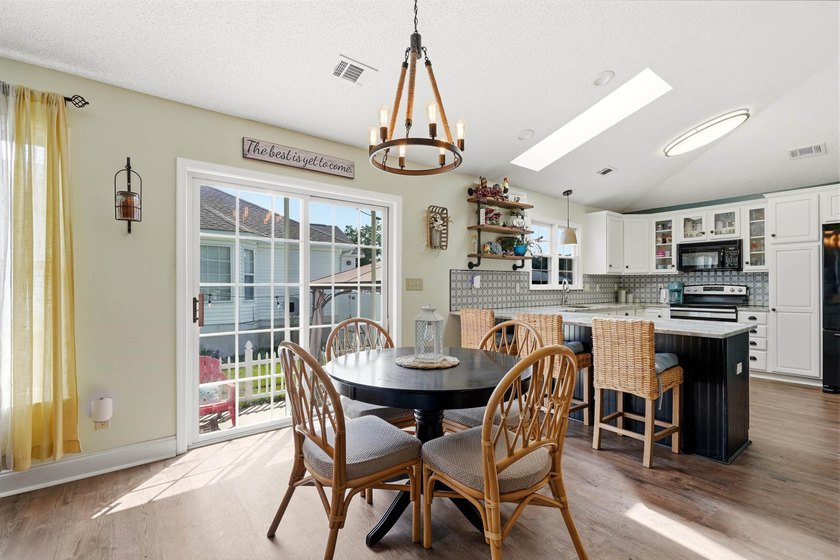 This beautifully updated 3-bedroom, 2-bath home offers both - photo 8