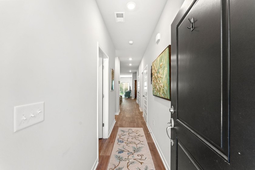 Experience refined coastal living in this beautifully upgraded - photo 3
