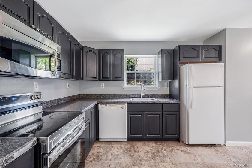 Welcome to 88 Eleanor Avenue, a well-maintained ranch situated - photo 9