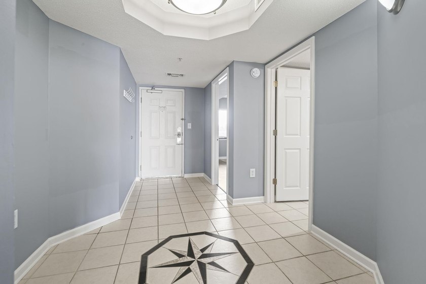 Welcome to Yacht Club Villas in the highly sought-after Barefoot - photo 2