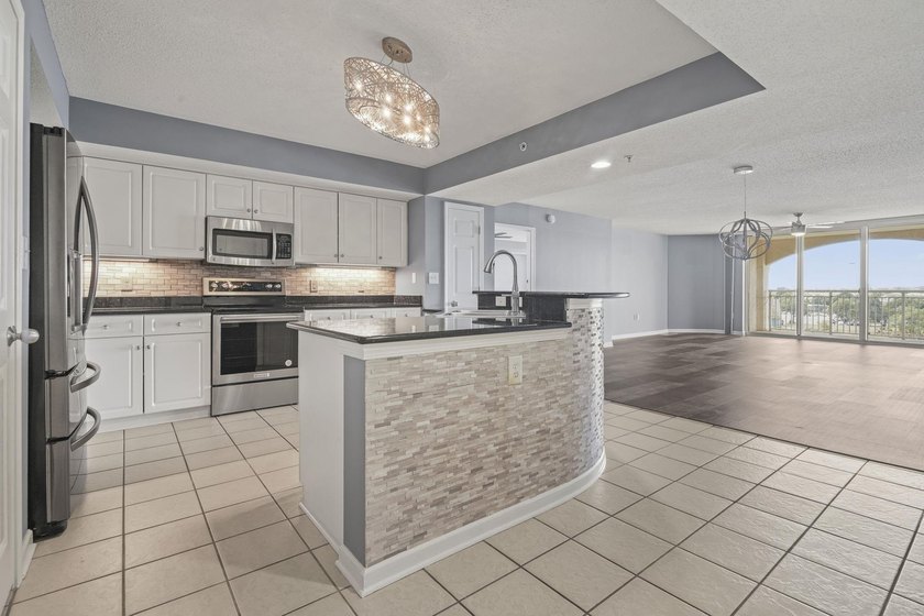 Welcome to Yacht Club Villas in the highly sought-after Barefoot - photo 5