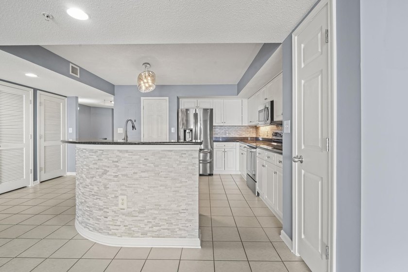 Welcome to Yacht Club Villas in the highly sought-after Barefoot - photo 7