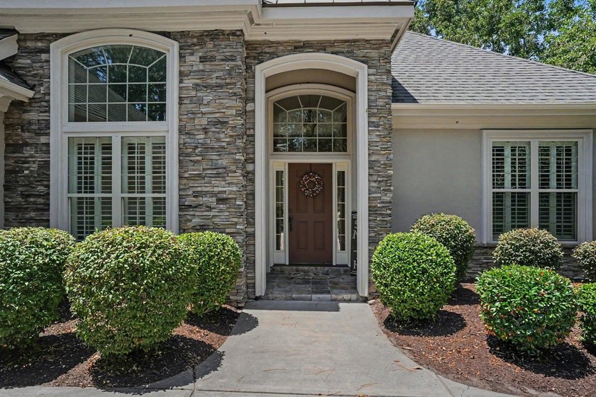 Welcome to this exquisite 4 bed 3.5 bath home situated on a - photo 3