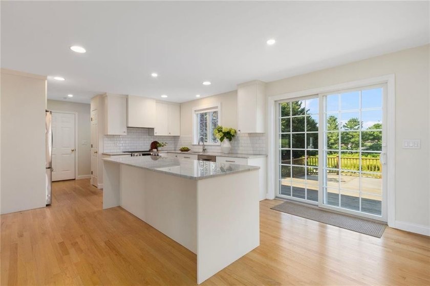 Located in the desirable Island Drive neighborhood, this - photo 2