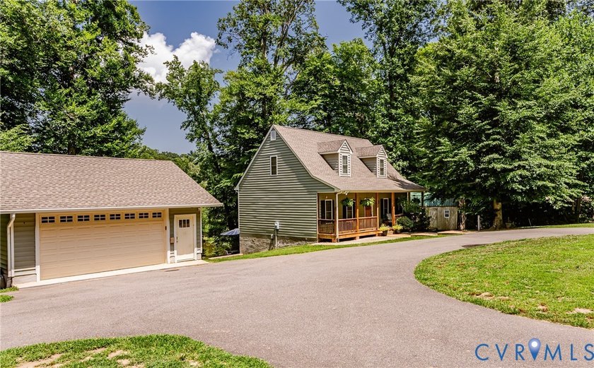 This beautiful lakefront home on over an acre features an open - photo 4