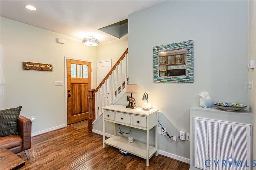This beautiful lakefront home on over an acre features an open - photo 8