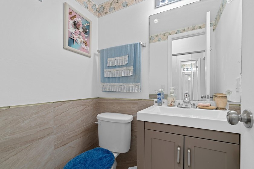 Remodeled one bedroom condo featuring garden view from the - photo 10
