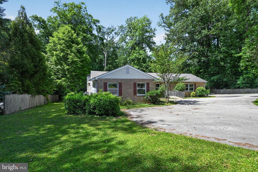 Convenient and spacious, this 4-bedroom, 2-full-bath ranch home - photo 2