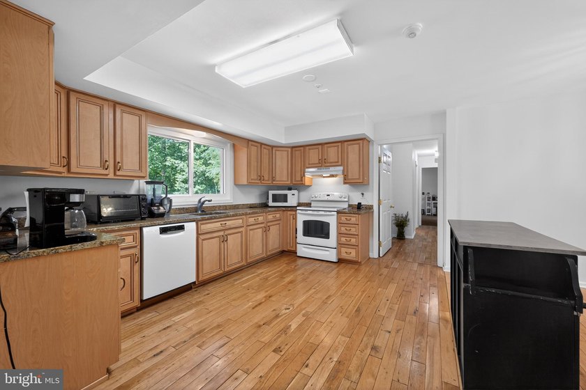 Convenient and spacious, this 4-bedroom, 2-full-bath ranch home - photo 7