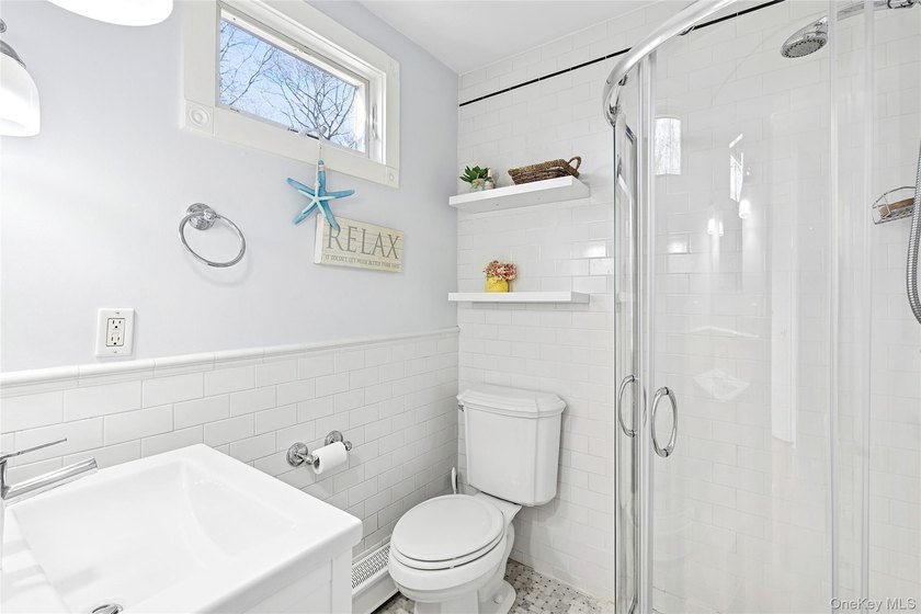 On a private, scenic, .98-acre lot in East Hampton Village - photo 12