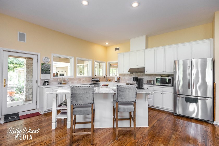 Welcome home to this stunning Harvest Construction custom home - photo 19