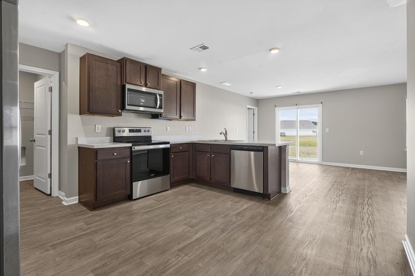 Experience the perfect blend of modern comfort and coastal - photo 7