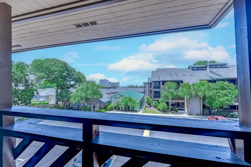 Relax in the large 3rd floor end unit with an Oceanview. The - photo 3