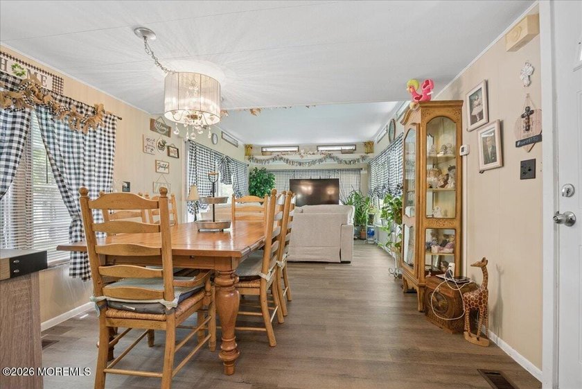 Welcome home! This stylish mobile home offers two bedrooms, a - photo 6