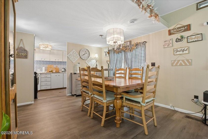 Welcome home! This stylish mobile home offers two bedrooms, a - photo 7