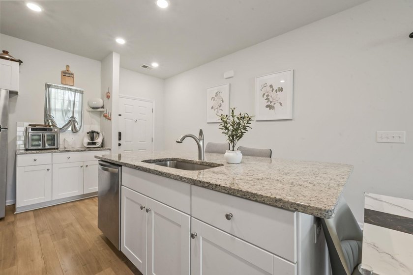 Tranquil Pond Views Await at 530 Carrick Loop in Arbor Glen! - photo 5