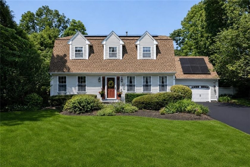 Welcome to this beautifully updated 4-bedroom, 3 full-bath - photo 2