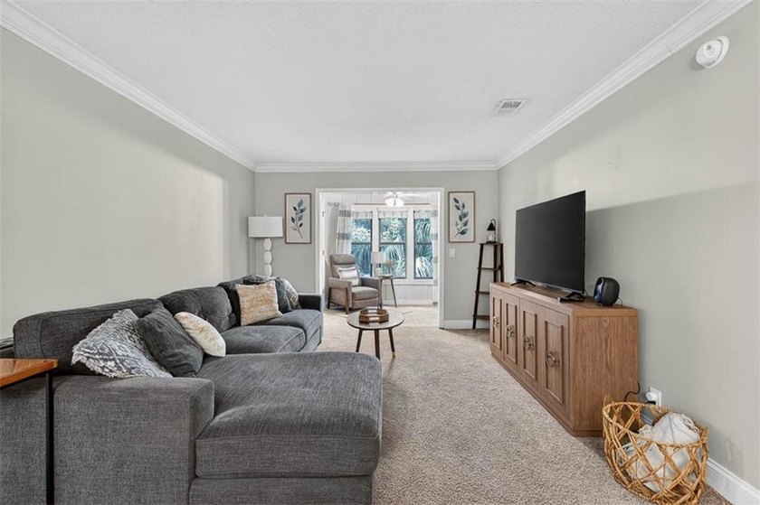Move-in ready and located within a sought-after gated community - photo 11