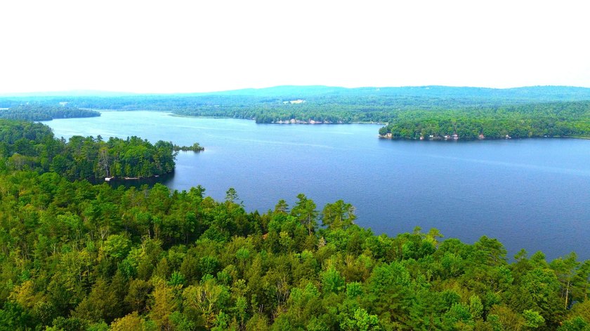 Located in a quiet lake community, this serene 1.02 acre parcel - photo 12