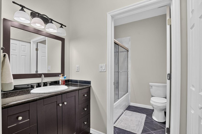 3 Bedroom 2 1/2 bath single family home. Vaulted ceilings - photo 30