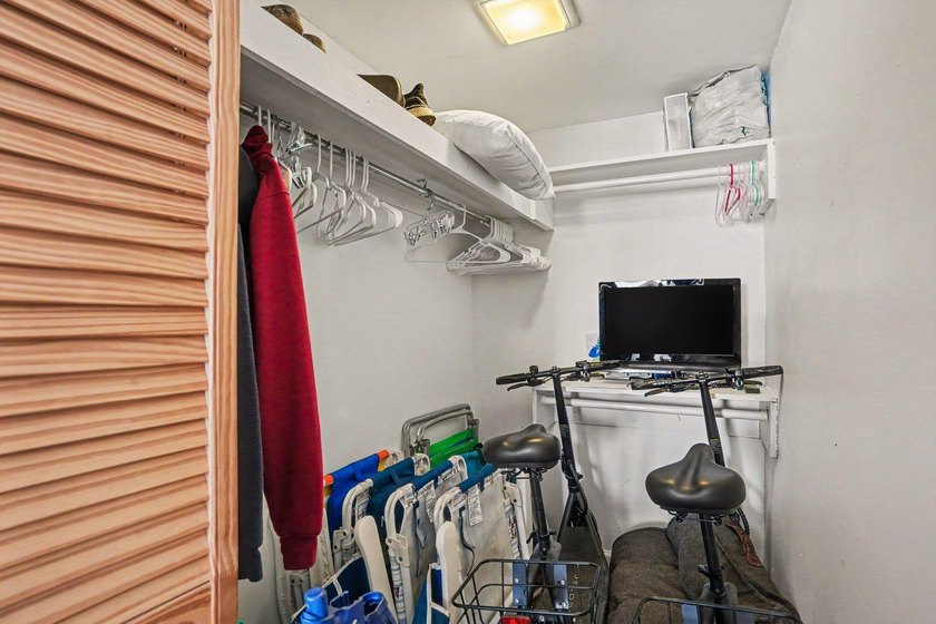 Just a short walk to the beach, this updated second-floor condo - photo 8