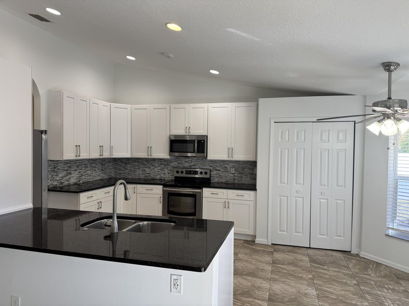 This is a perfect location for a commuter or a family that wants - photo 15