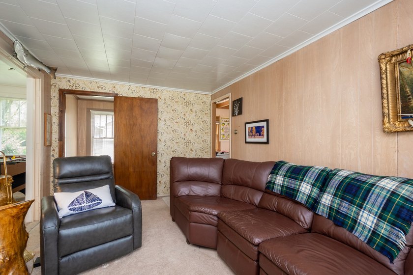 Cute as can be and full of charm! Welcome to this inviting lake - photo 11