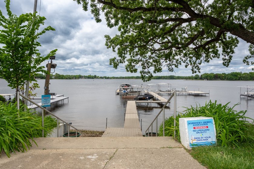 Cute as can be and full of charm! Welcome to this inviting lake - photo 26