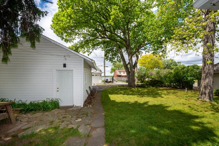 Cute as can be and full of charm! Welcome to this inviting lake - photo 29