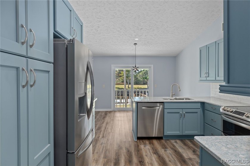Tucked within the highly sought-after Riverhaven Village - photo 15