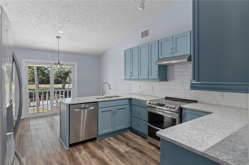 Tucked within the highly sought-after Riverhaven Village - photo 16