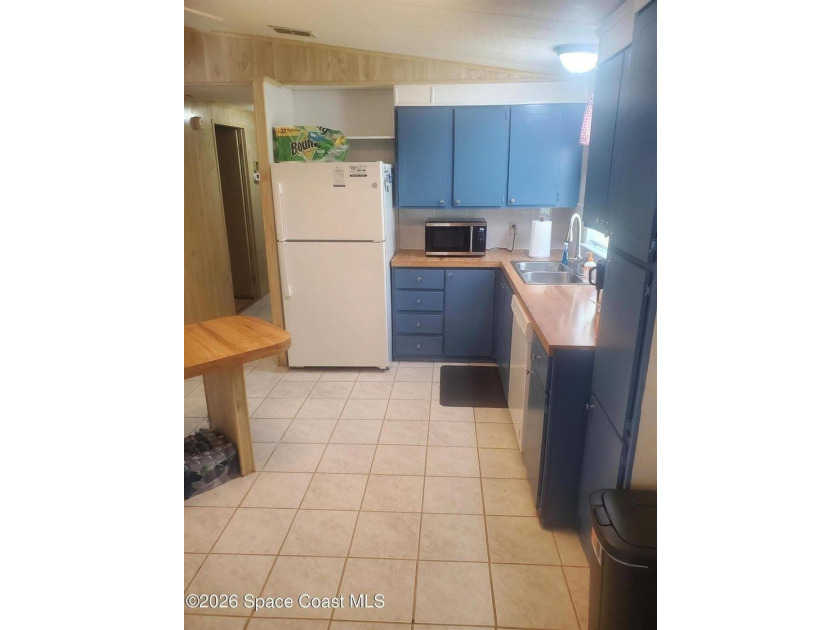 This 2-bedroom 2-bathroom home is a great opportunity for an - photo 12