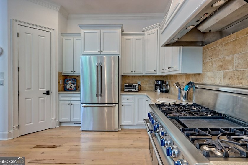 Nestled in the coveted Waterfall at Lake Burton community, this - photo 16