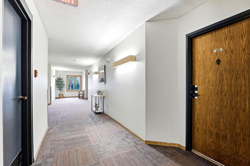 Immaculate and move in ready, unit #303 features the bonus of a - photo 21