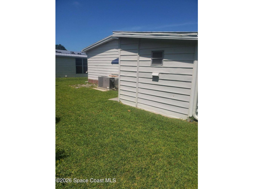 This 2-bedroom 2-bathroom home is a great opportunity for an - photo 25