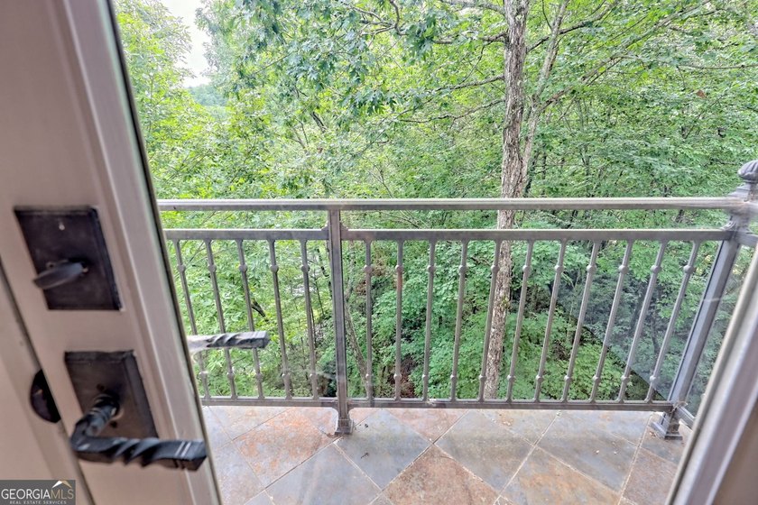 Nestled in the coveted Waterfall at Lake Burton community, this - photo 50