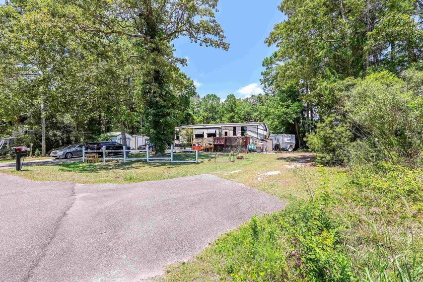 Discover the potential of this 1.03-acre property located at 297 - photo 2