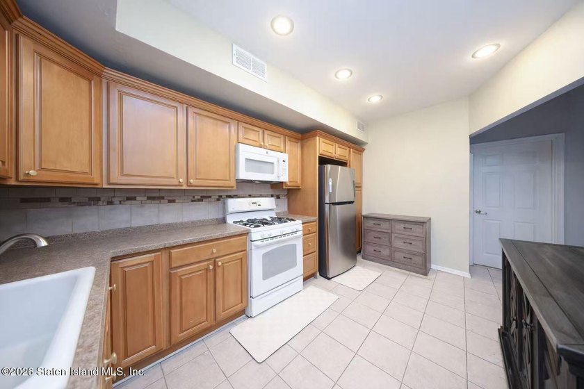 Stunning Two Family Semi-Attached home conveniently located to - photo 21