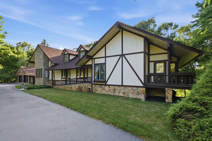 Welcome to 305 Beech Street, a truly special Tudor-inspired home - photo 2