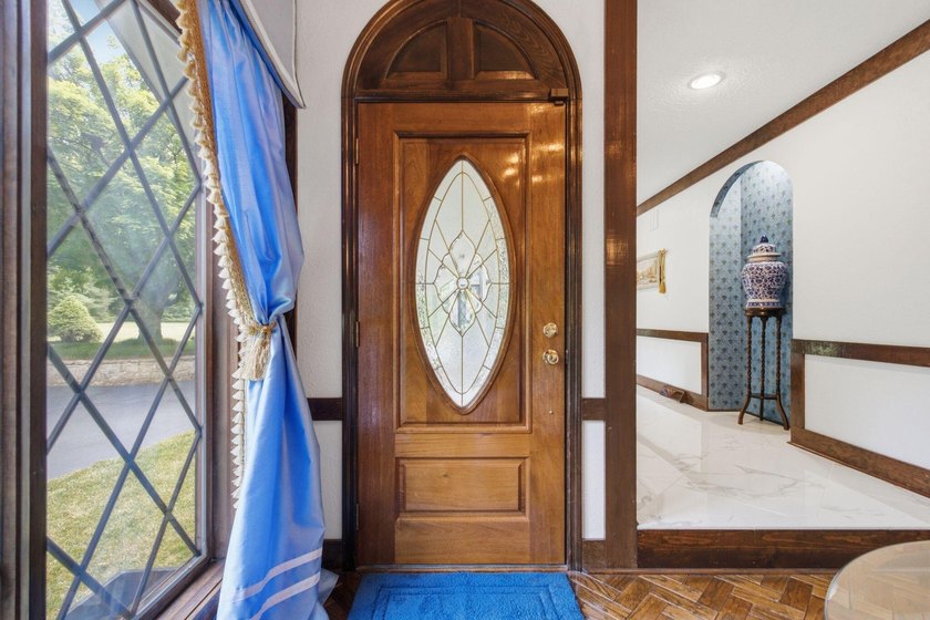 Welcome to 305 Beech Street, a truly special Tudor-inspired home - photo 8