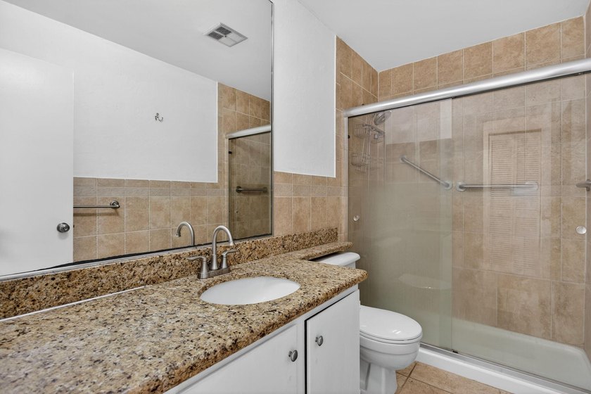 Spacious 4-bedroom, 2.5-bath townhouse ideally located in - photo 20