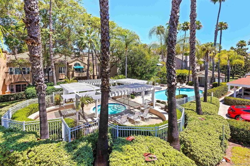 Enjoy ultimate resort-style living overlooking a sparkling pool - photo 3