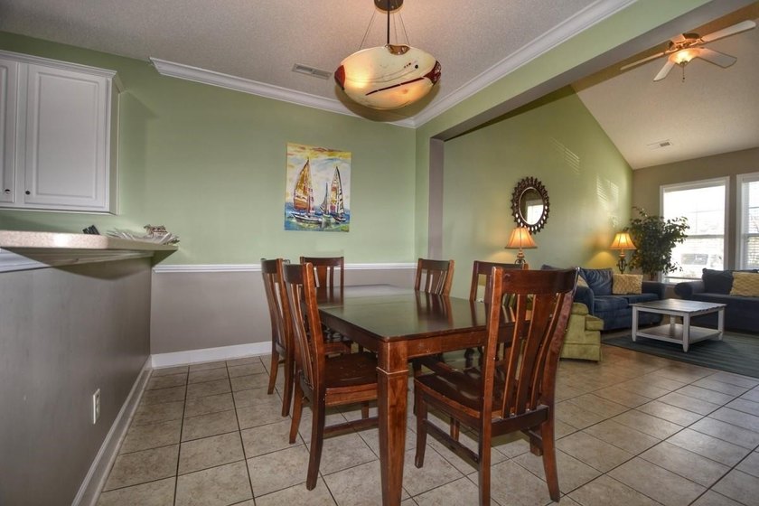 Experience coastal living in this bright and fully furnished - photo 6