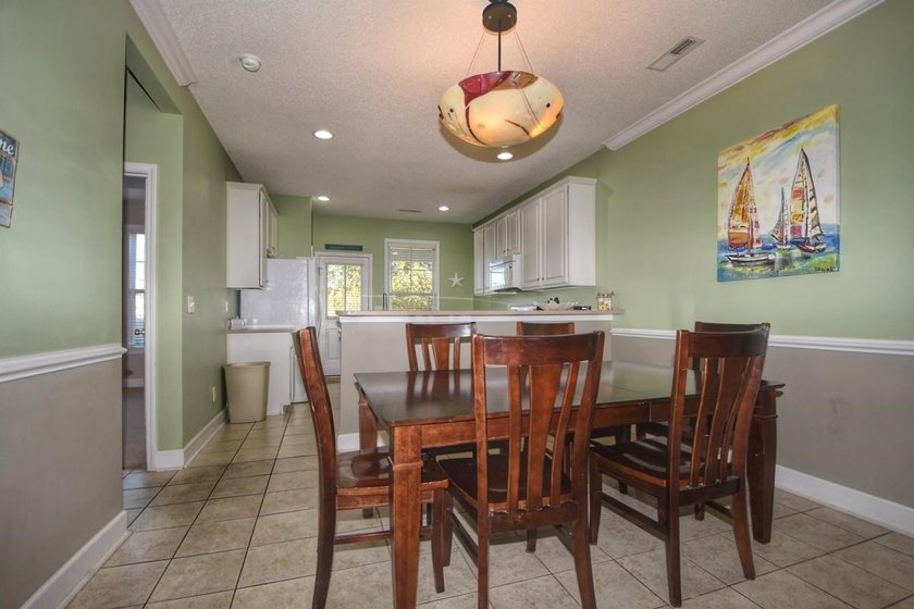 Experience coastal living in this bright and fully furnished - photo 7