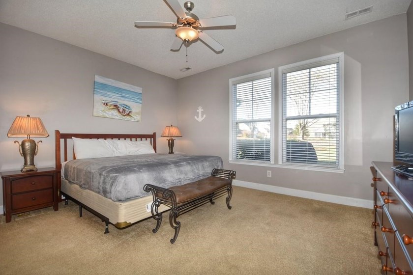 Experience coastal living in this bright and fully furnished - photo 10