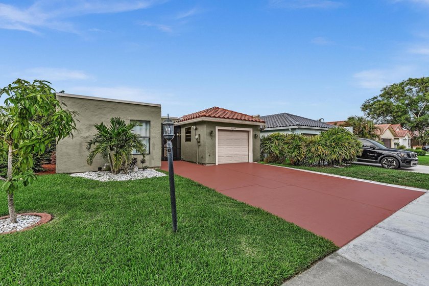 Contemporary. Superb curb appeal with S-Tile roof &amp; long lake - photo 40
