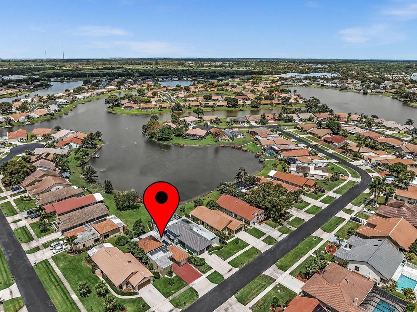 Contemporary. Superb curb appeal with S-Tile roof &amp; long lake - photo 44