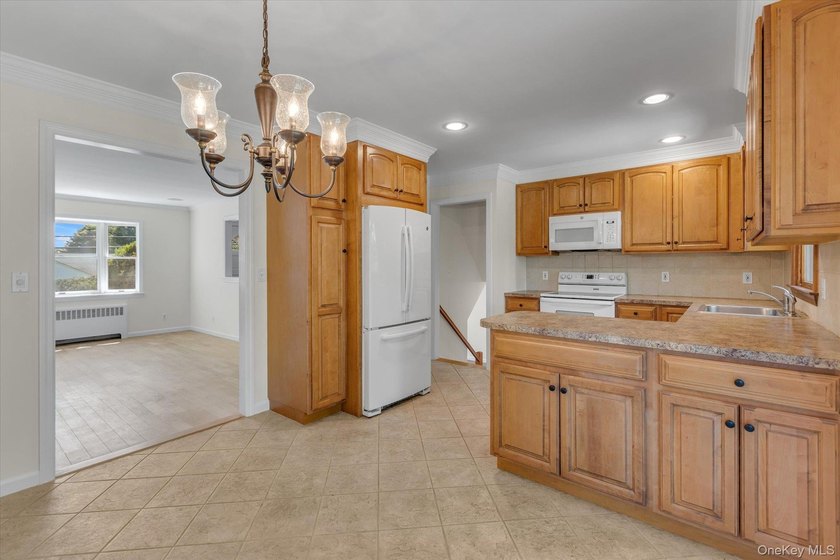 Move right into this beautifully updated split-level home - photo 9
