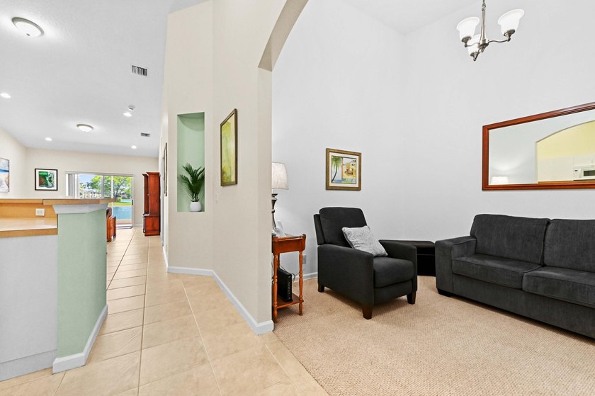 Experience serene lakefront living in this immaculately - photo 9
